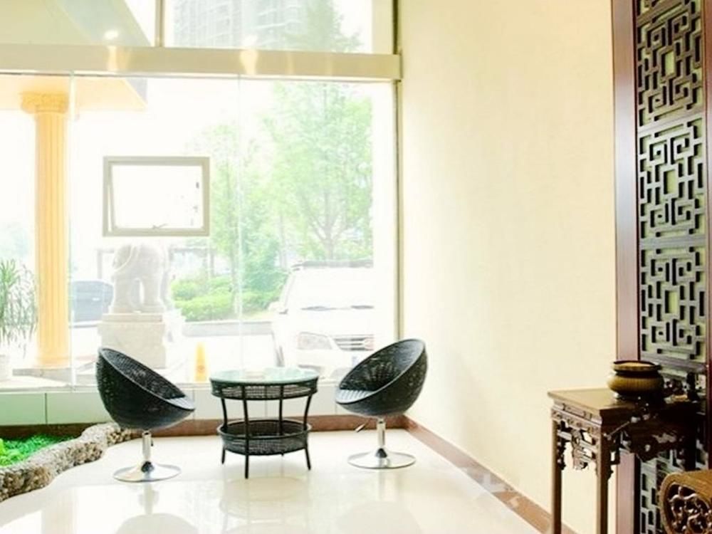 Chengshi Kaijing Hotel Yichang Extérieur photo